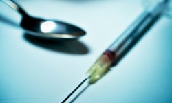 a spoon and a syringe